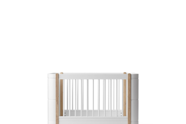 【结构设计笔记】Oliver Furniture Wood Mini+ 婴儿床：用 2 档床板 + 3 根可拆侧栏条，做一张能从 0 岁用到 9 岁的床